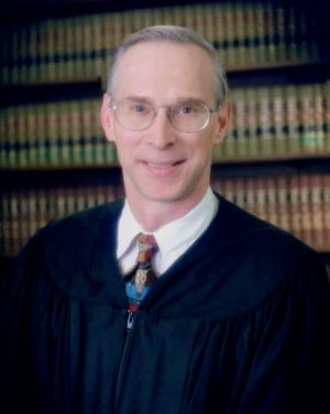 Honorable James M. Justin